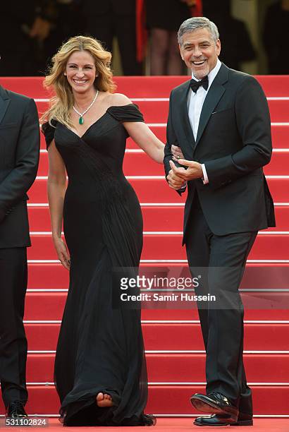 Julia Roberts and George Clooney attend the screening of "Money Monster" at the annual 69th Cannes Film Festival at Palais des Festivals on May 12,...