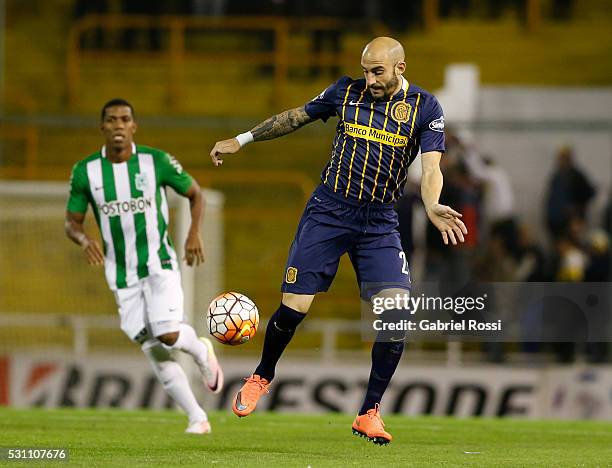 Javier Pinola of Rosario Central kicks the ball during a first leg match between Rosario Central and Atletico Nacional as part of quarter finals of...