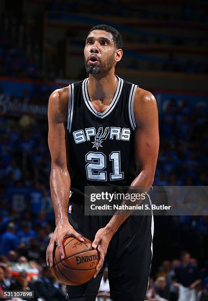 Tim Duncan of the San Antonio Spurs shoots a free throw against the Oklahoma City Thunder in Game Six of the Western Conference Semifinals during the...