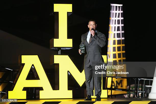 Superstar and actor John Cena presents The Land Rover Above & Beyond Award onstage at the Invictus Games Orlando 2016 Closing Ceremony at ESPN Wide...