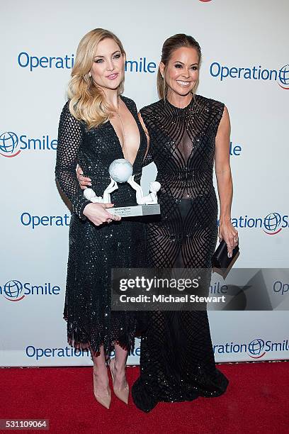 Actress Kate Hudson and tv personality Brooke Burke-Charvet attend the 2016 Operation Smile Gala at Cipriani 42nd Street on May 12, 2016 in New York...