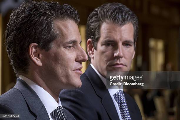 Cameron Winklevoss, chief executive officer and co-founder of Gemini Trust Company LLC, left, speaks as Tyler Winklevoss, chief financial officer and...