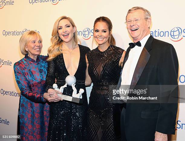 Universal Smile Award Recipient actress Kate Hudson and TV personality Brooke Burke-Charvet pose for a photo together with Operation Smile...