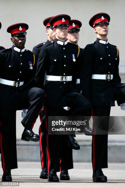 Prince Harry takes part in the Trooping Of New Colours alongside his fellow officer cadets at the Royal Military Academy, Sandhurst on June 21, 2005...