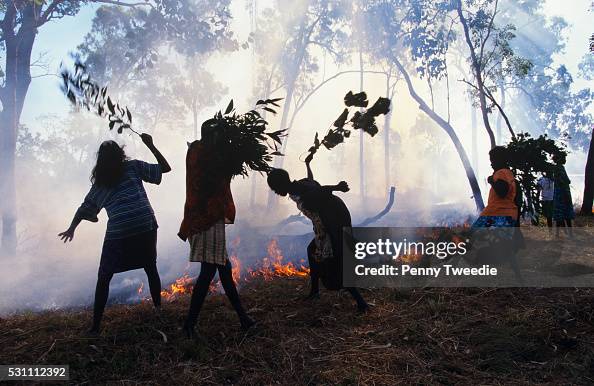 Ramingining Aboriginal children from Ramingining school beat out the approaching ...