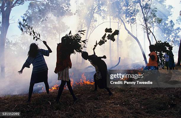 Ramingining Aboriginal children from Ramingining school beat out the approaching ...