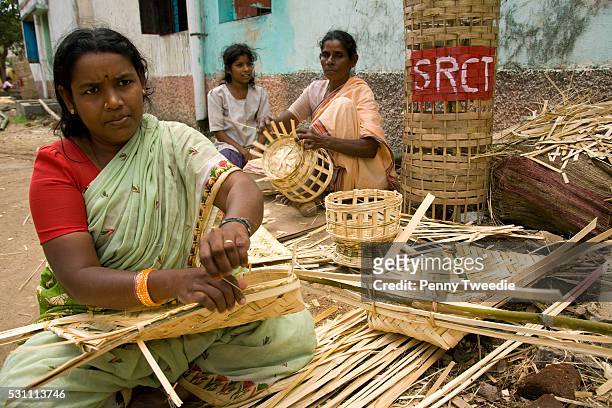 Women in Velipalayam belong to "bharatham" a self help group weaving mats and baskets from bamboo to generate income and support for those affected...