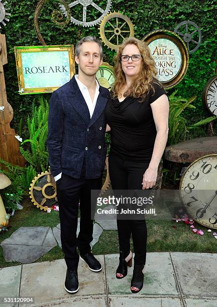 Actor Adam Shulman and Heidi Nahser Fink, co-designers of James Banks, attend Disney's Alice Through the Looking Glass event on May 12, 2016 at...