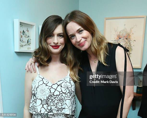 Actress Anne Hathaway and actress Emily Blunt attend Disney's Alice Through the Looking Glass event on May 12, 2016 at Roseark in Los Angeles...