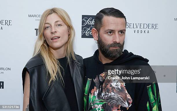 Ada Kokosar and Designer Marcelo Burlon attend Tyga's Capsule Collection Launch Party at The Blond at 11 Howard Hotel on May 12, 2016 in New York...