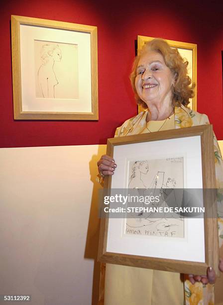 Genevieve Laporte, 79-years-old, drawings made by Spanish artist Pablo Picasso at Hotel Dassault, 21 June 2005 in Paris. Laporte who had a two-year...