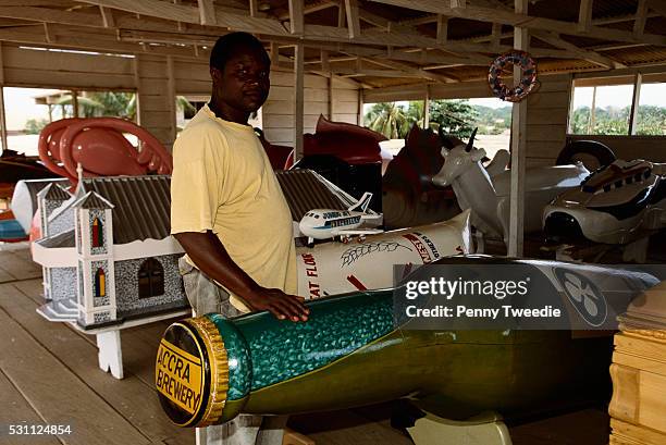 man standing next to designed coffin - cercueil photos et images de collection