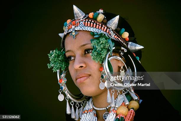 berber woman wearing ornate jewelry - berber jewelry stock pictures, royalty-free photos & images