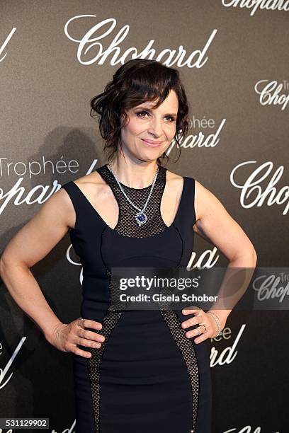 Juliette Binoche arrives at the Chopard Trophy Ceremony at the annual 69th Cannes Film Festival at Hotel Martinez on May 12, 2016 in Cannes, France.