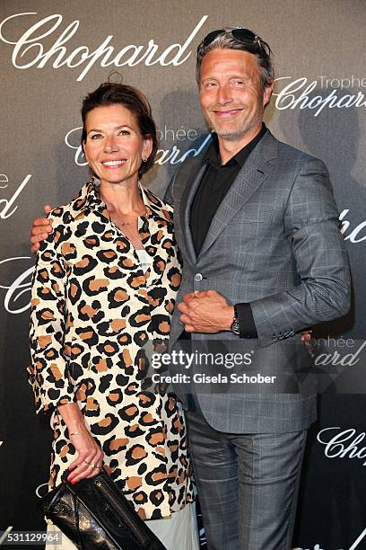 Mads Mikkelsen and his wife, Hanne Jacobsen arrive at the Chopard Trophy Ceremony at the annual 69th Cannes Film Festival at Hotel Martinez on May...