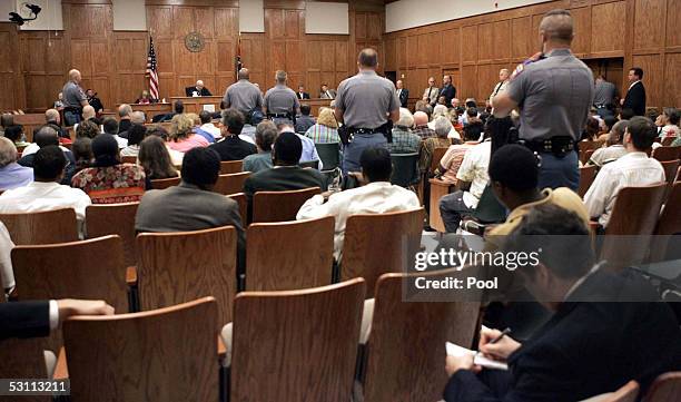 State troopers stand in the aisles as local law enforement guard the doorways prior to the reading of the verdict in the murder trial of Edgar Ray...