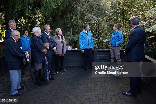 Emma Bean talks to Prime Minister John Key and other guests about handling 'Mighty Dash', Rainbow Springs 1,500th kiwi chick, during his visit to...