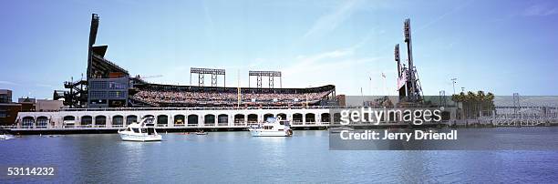 Boats filled with fans wait in the waters of McCovey Cove out side of SBC Park during a game between the Washington Nationals and the San Francisco...