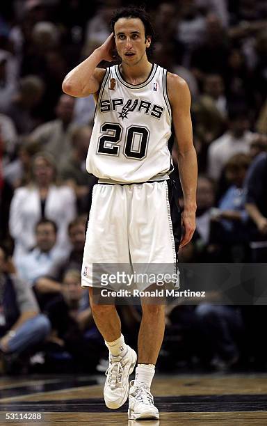 Manu Ginobili of the San Antonio Spurs walks on the court in the final moments of the Spurs' loss to the Detroit Pistons in Game six of the 2005 NBA...