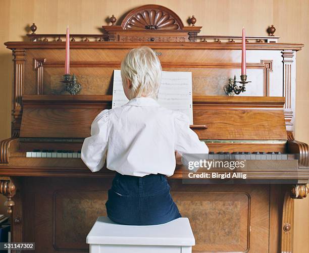 girl playing piano - blouse back stock pictures, royalty-free photos & images