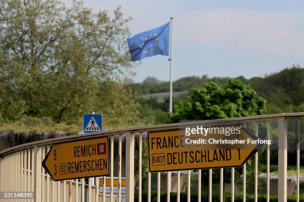 Direction signs point to Germany and France in the town of Schengen where the 1985 European Schengen Agreement was signed on May 11, 2016 in...