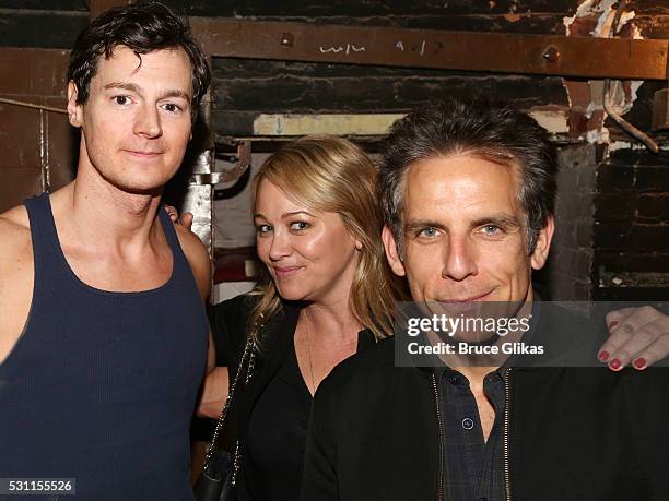 Benjamin Walker, Christine Taylor and Ben Stiller pose backstage at the hit musical based on the cult film "American Psycho" on Broadway at The...