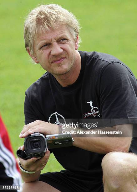 Film Director and former professional football player Soenke Wortmann films the German National Team during the training session of the German...