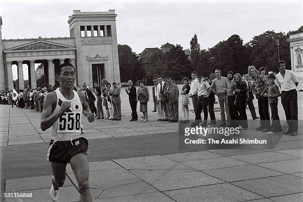 Kenji Kimihara of Japan competes in the Men's Marathon during the Munich Summer Olympic Games on September 10, 1972 in Munich, Germany.