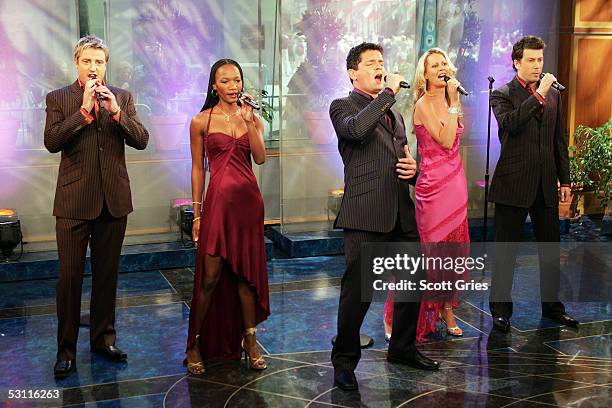 Geoff Sewell, Tsakane Valentine, Nick Garrett, Jo Appleby, and David Habbin of the opera band Amici Forever perform during The Today Show in the NBC...