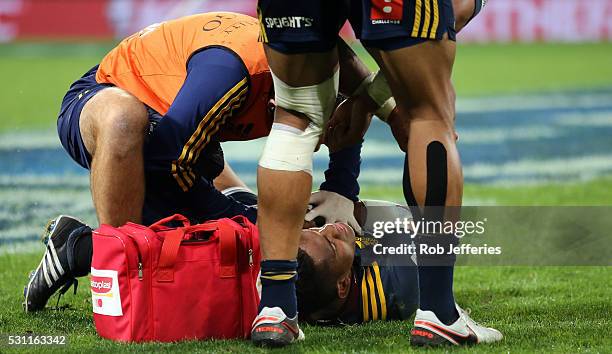 Waisake Naholo of the Highlanders is attended to by medics during the round twelve Super Rugby match between the Highlanders and Crusaders at Forsyth...