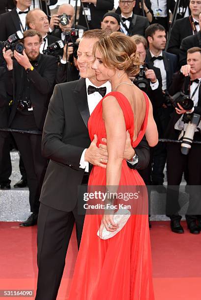 Rocco Siffredi and his wife Rozsa Tassi attend the'Money Monster' premiere during the 69th annual Cannes Film Festival at the Palais des Festivals on...