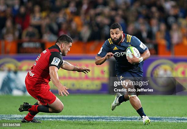 Lima Sopoaga of the Highlanders on the attack during the round twelve Super Rugby match between the Highlanders and Crusaders at Forsyth Barr...