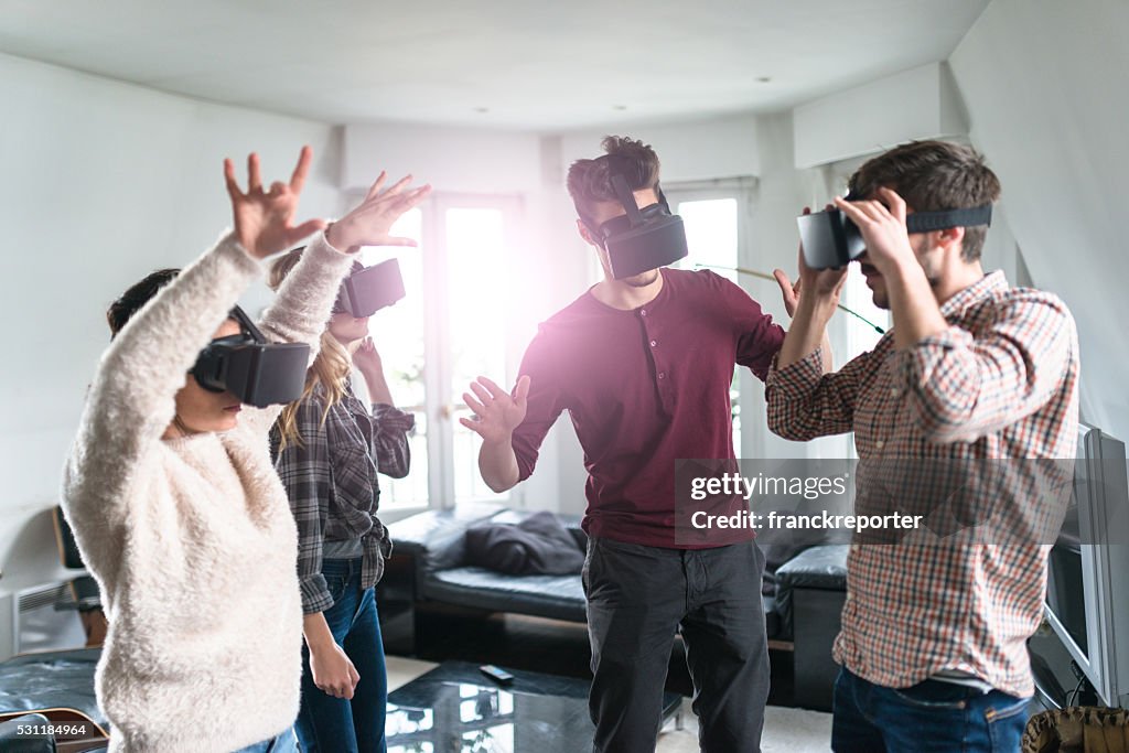 Friends dancing using the VR simulator togetherness