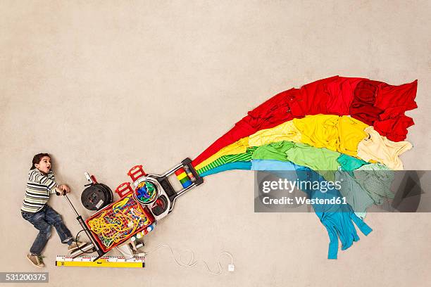 boy developing new color cannon - young inventor stock pictures, royalty-free photos & images