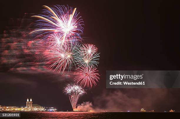 usa, illinois, chicago, fireworks at navy pier at lake michigan - navy pier stock pictures, royalty-free photos & images