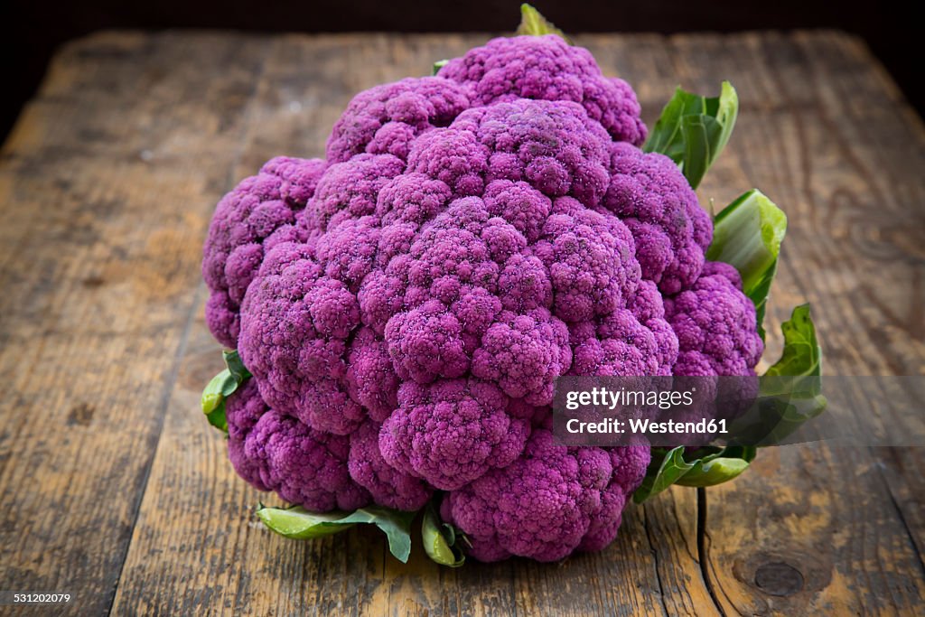 Purple cauliflower on wood