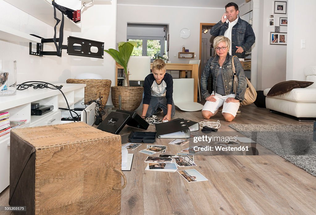 Family watching chaos after burglary when coming back in their one-family house