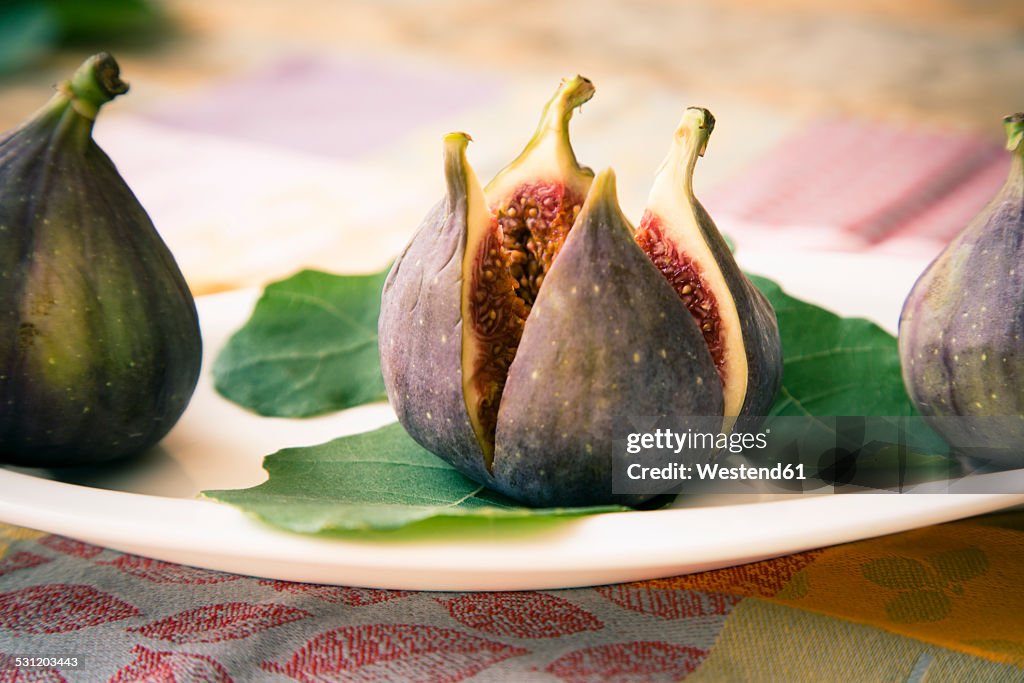 Fresh cut fig with leaves
