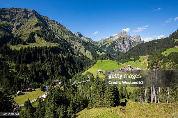 austria, vorarlberg, hochtannberg mountain pass near schroecken - mountain village stockfoto's en -beelden