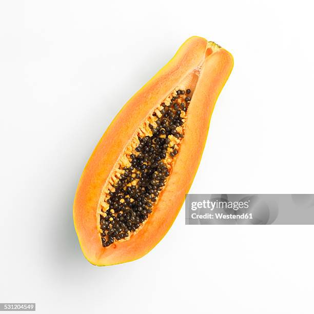 halved papaya - papaye photos et images de collection
