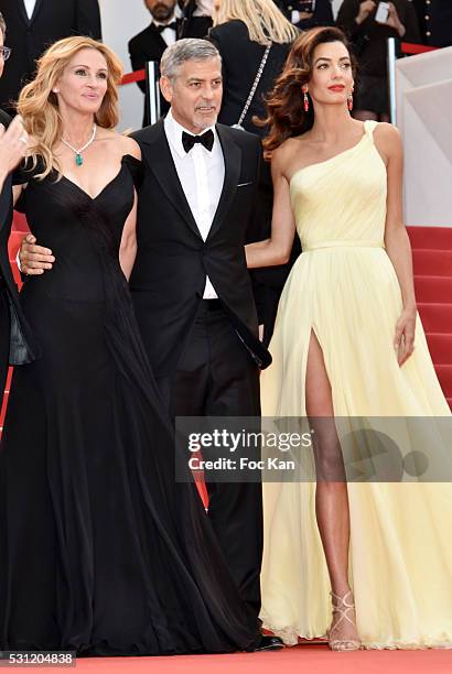 Julia Roberts, George Clooney and Amal Clooney attend the'Money Monster' premiere during the 69th annual Cannes Film Festival at the Palais des...