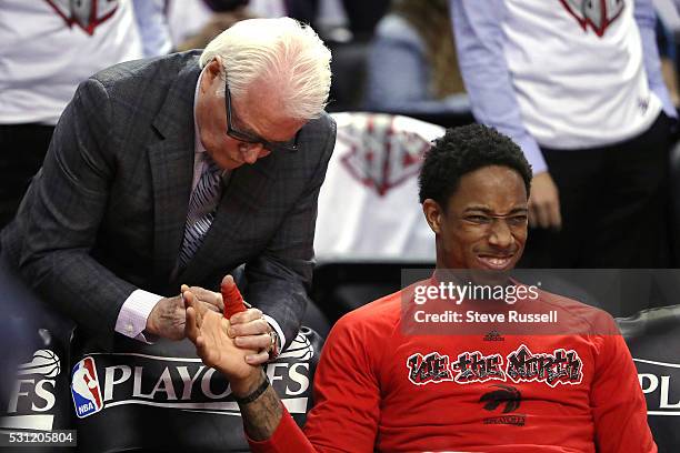 DeMar DeRozan has his thumb wrapped in string before the game as the Toronto Raptors play the Miami Heat in game five of their Eastern Conference...