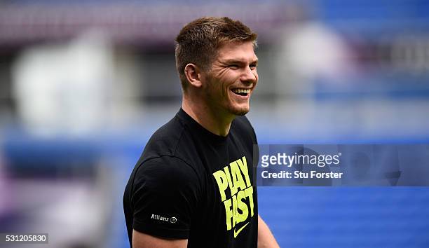 Owen Farrell of Saracens raises a smile during Saracens Captain's Run at Grand Stade de Lyon ahead of the European Rugby Champions Cup Final on May...