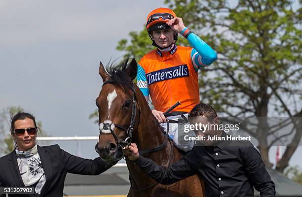 Jockey Robert Havlin and Cunco, the first offspring of the champion racehorse Frankel to appear on a racecourse, are lead back in by traveling head...