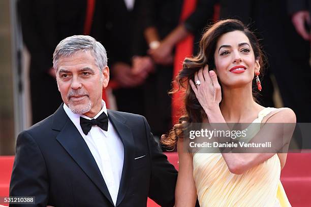 Actor George Clooney and his wife Amal Clooney attend the 'Money Monster' premiere during the 69th annual Cannes Film Festival at the Palais des...