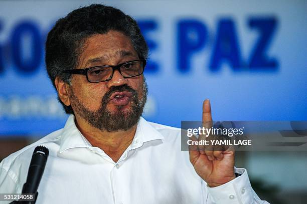 Commander of the FARC-EP leftist guerrillas Ivan Marquez reads a statement during the peace talks with the Colombian government at the Convention...