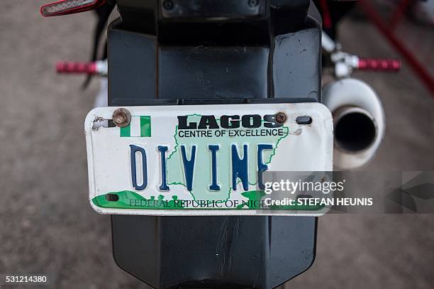 The number plate of a Yamaha enthusiast attending the opening ceremony of Yamaha in Lagos on May 13, 2016. CFAO Yamaha Nigeria Limited opened a new...