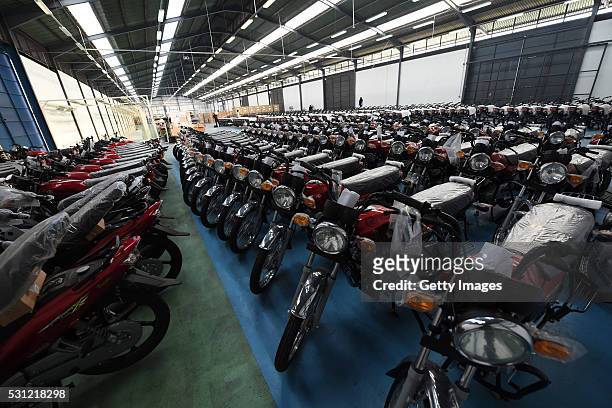 Motocycles displayed in the factory during the opening ceremony of CFAO Yamaha factory on May 13, 2016 in Lagos, Nigeria. Japanese Yamaha Motor Co...