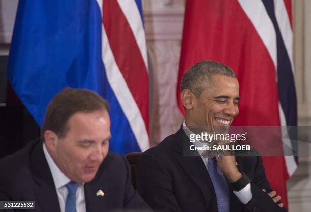 President Barack Obama laughs alongside Prime Minister Stefan Lofven of Sweden during a meeting as part of a State Visit with Nordic countries,...