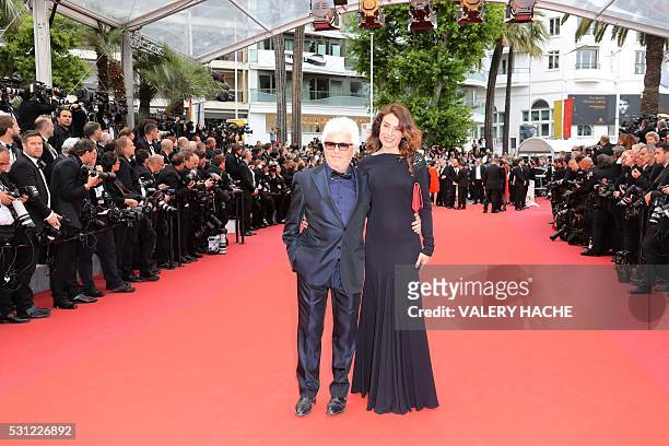 French musician Marc Cerrone and his wife Jill arrive on May 13, 2016 for the screening of the film "Ma Loute " at the 69th Cannes Film Festival in...
